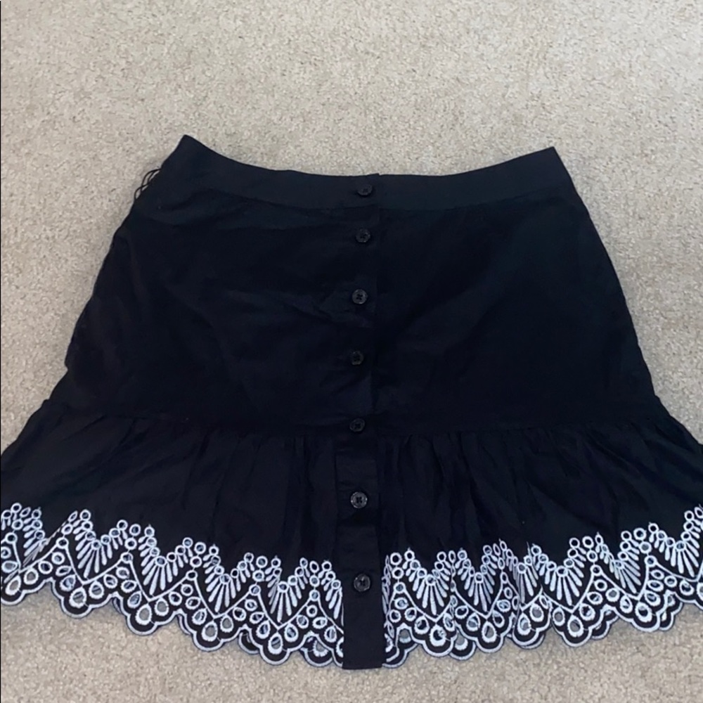 Black shirt with White embroidered trim